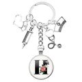 Latest Home Stethoscope Nurse Syringe Keychain A-Z Round Glass Dome Cabochon Pendant Men and Women Fashion Charm Keychain