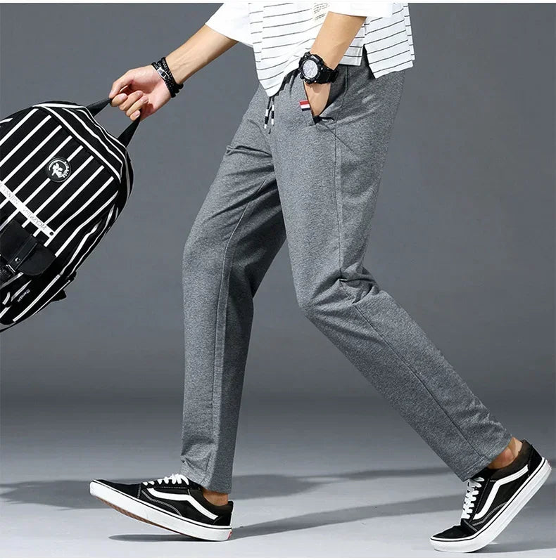 Spring Pants Men Fitness Sportswear Tracksuit Elastic Waist Sweatpants Cotton Trousers Loose Gyms Jogger Track Pants Mens M- 8XL