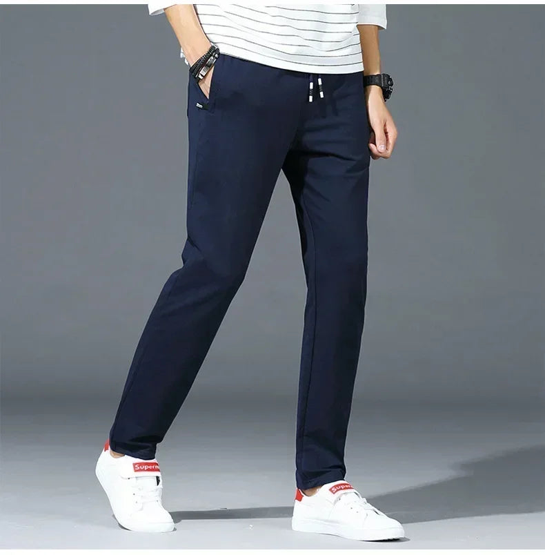 Spring Pants Men Fitness Sportswear Tracksuit Elastic Waist Sweatpants Cotton Trousers Loose Gyms Jogger Track Pants Mens M- 8XL