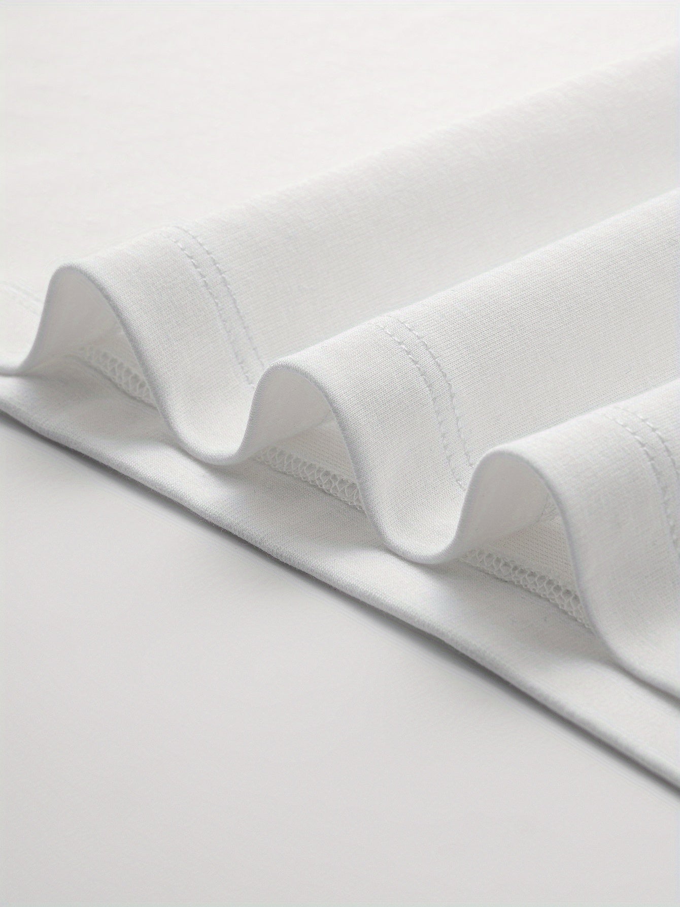 Women's Easter Nurse Graphic T-Shirt - Black Short Sleeve Crew Neck, Colorful Medical Themed Print, Soft Casual Top for Spring & Summer