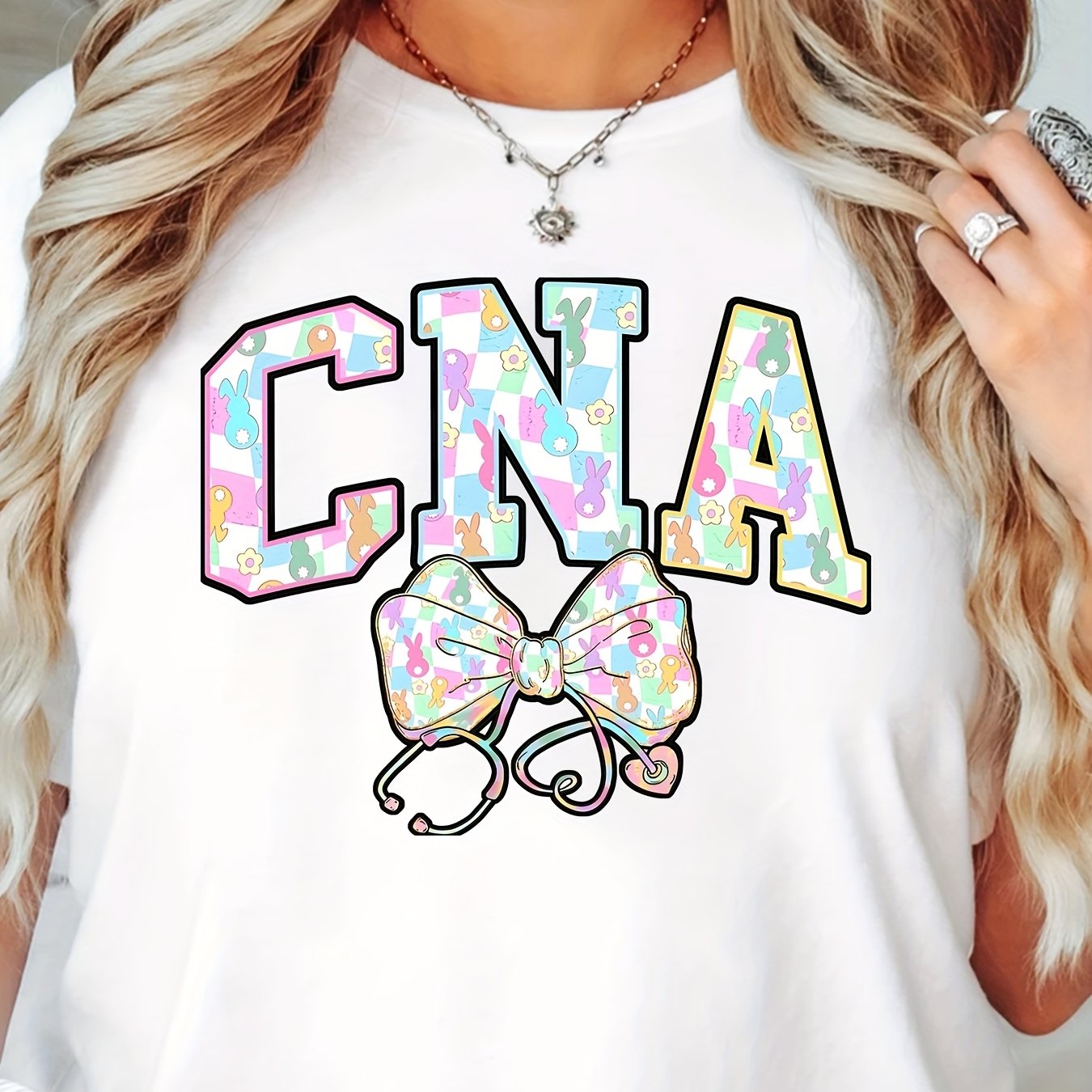 Women's CNA Nurse Bunny Graphic T-Shirt - 100%, Short Sleeve, Round Neck, Machine Washable, Playful Easter Design with Colorful Bunny Ears & Stethoscope, Spring/Summer Casual Tee for, Spring Fashion Top | Casual Round Neck |