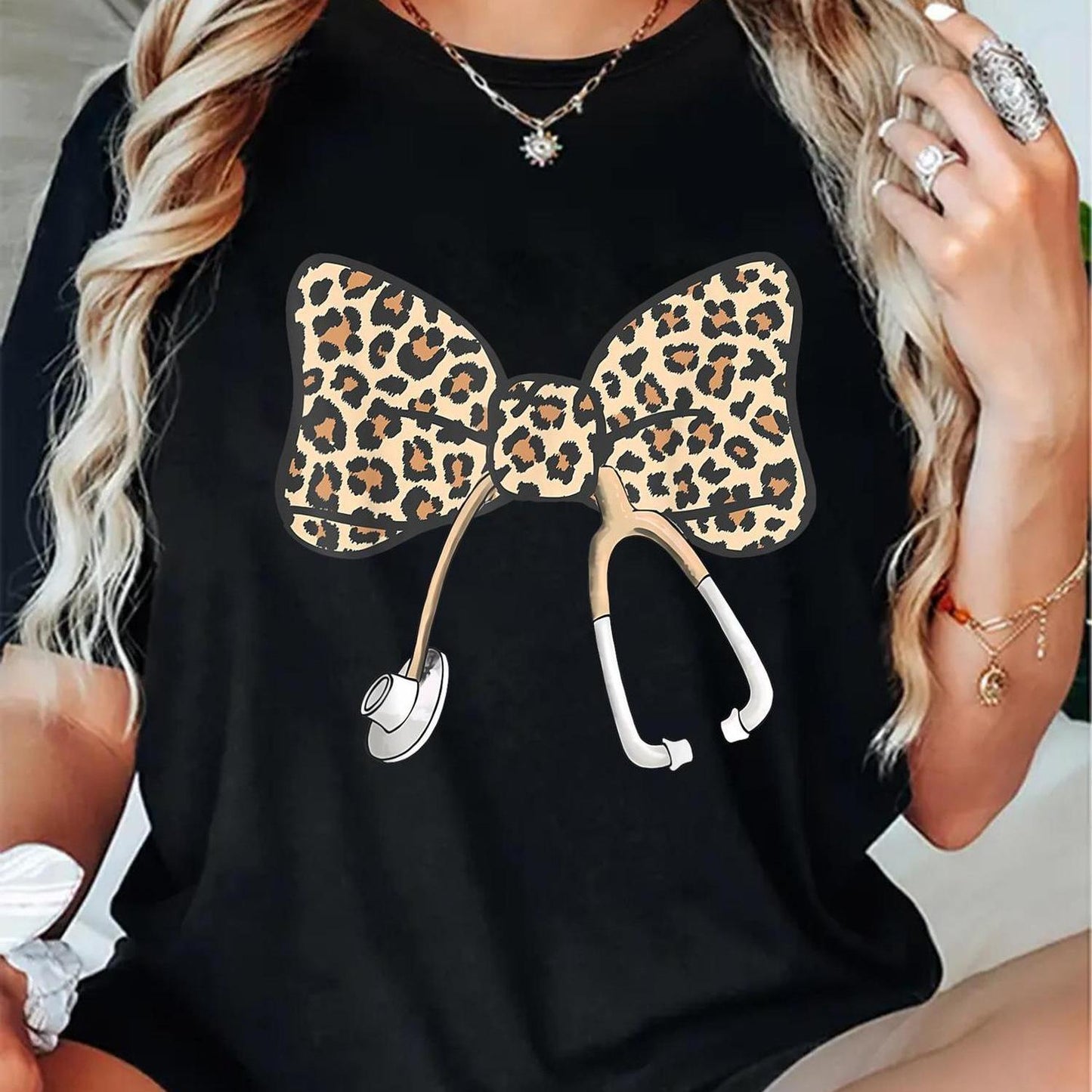 Women's Leopard Print Bow & Stethoscope Graphic T-Shirt - Casual Short Sleeve Tee, Black Nurse-Themed Top for Medical Professionals, Casual Wear | Bold Graphic Tee | Durable Print Shirt